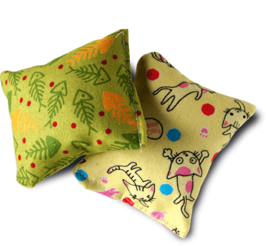 Two colorful catnip pillow toys