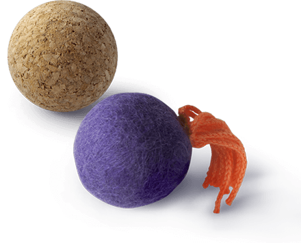 A cork ball and a felt ball cat toys
