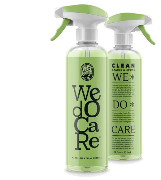 cleaning supplies in green spray bottles