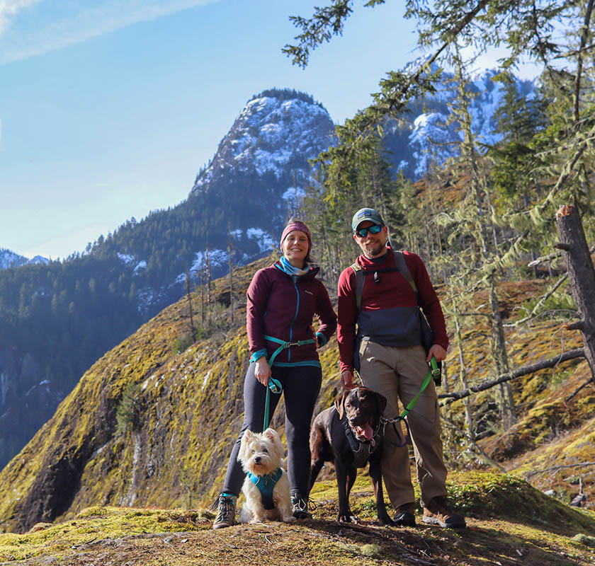 Author, two dogs and friend on a hike